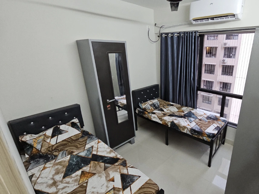 Two-sharing room designed with personal storage and a clean contemporary layout