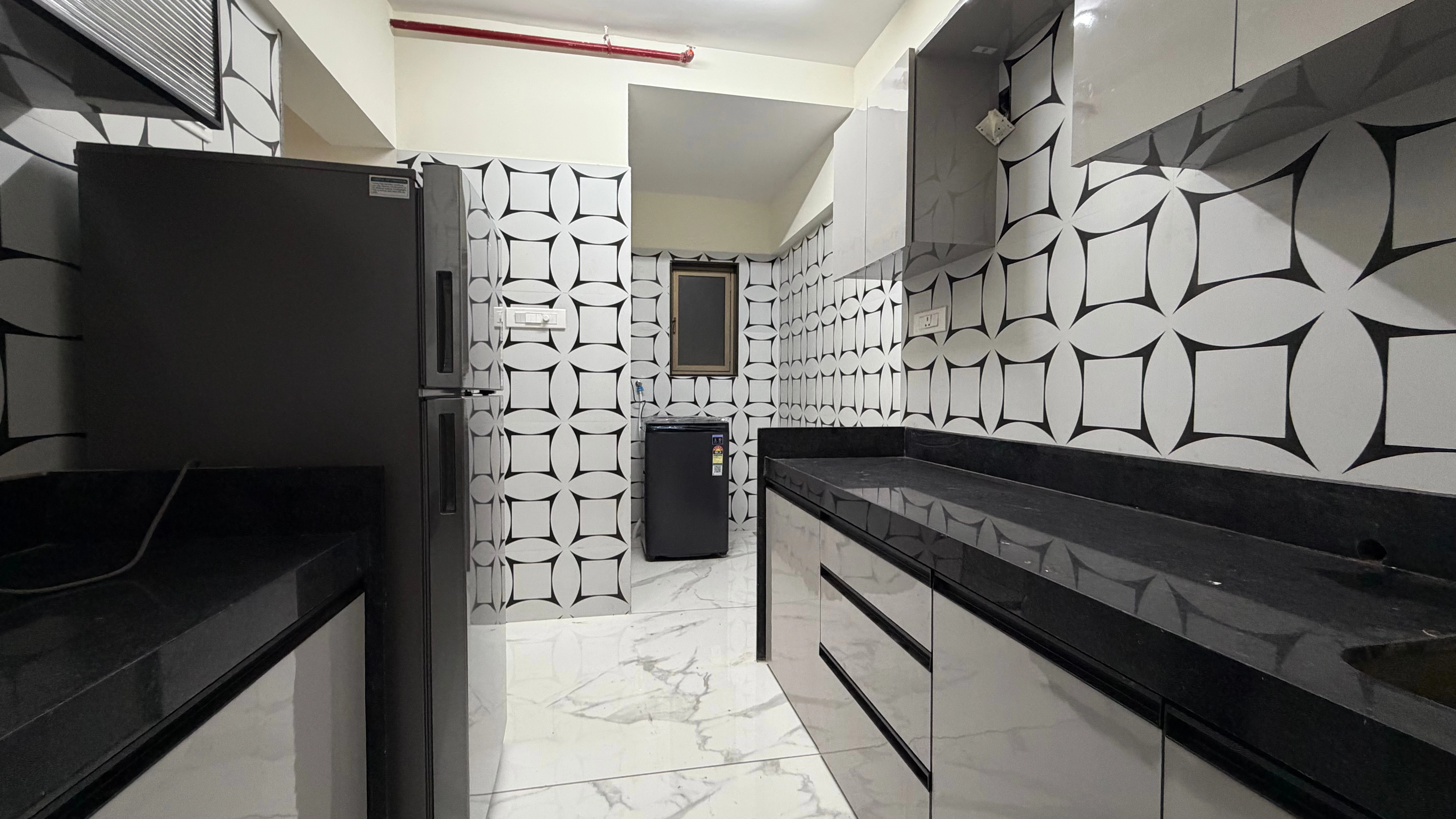 Fully equipped kitchen in a PG near BKC Mumbai