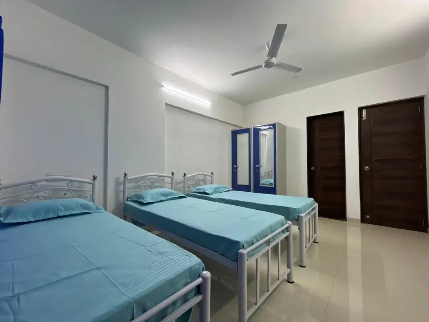 Furnished PG bedroom interior at Parijat Tower, Sakinaka